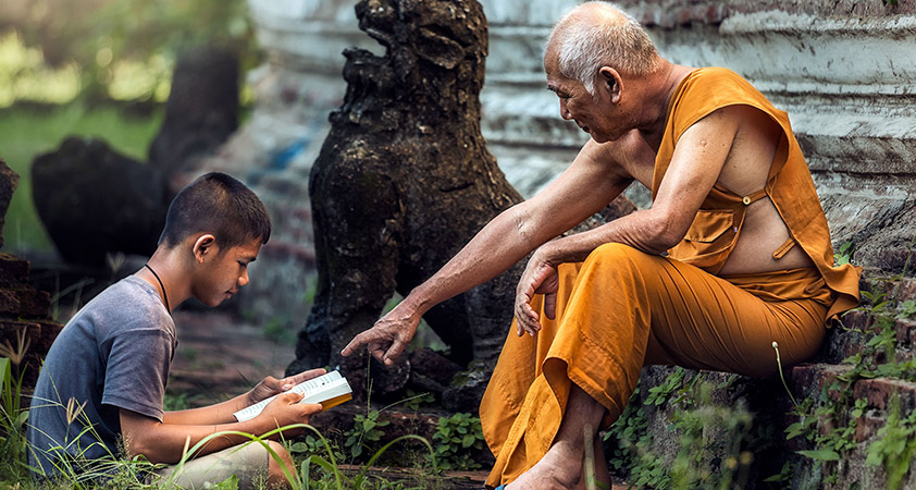 A monk at Kroul Romeas Group