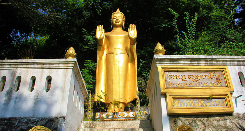 On top of the hill is That Chomsi, a golden pagoda topped with a 7 tiered parasol