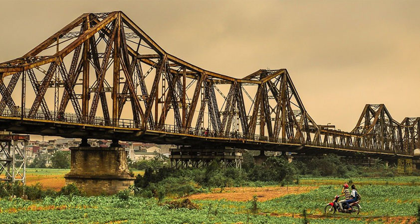 Get the delightful breeze on Long Bien Bridge