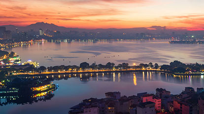Admire the sunset on West Lake in Hanoi Vietnam