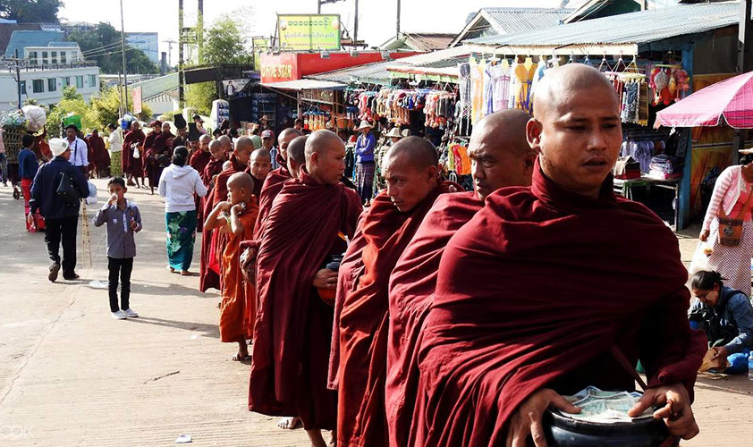 Join a Buddhist almsgiving ceremony