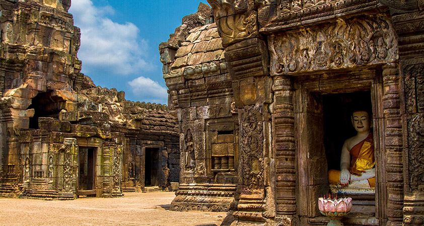 Wat Nokor is a modern Theravada Buddhist pagoda squeezed into the walls of an 11th century