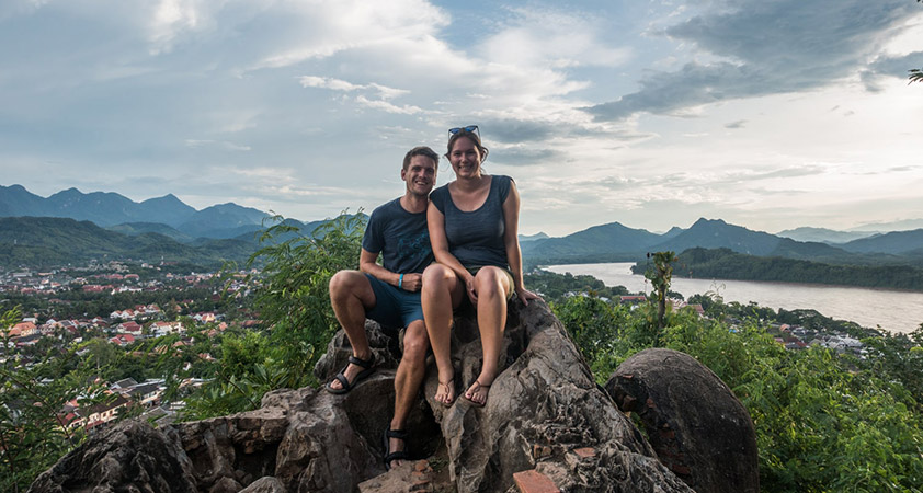 Luang Prabang is renowned for its gleaming temple roofs, colonial architecture and stunning mountain backdrop