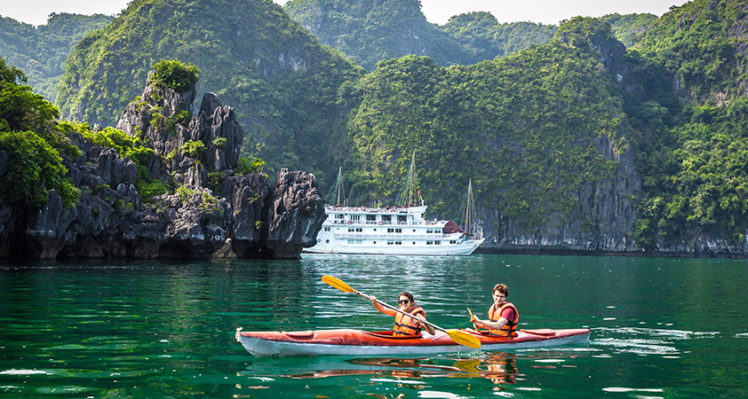 Enjoy kayaking in Bai Tu Long Bay