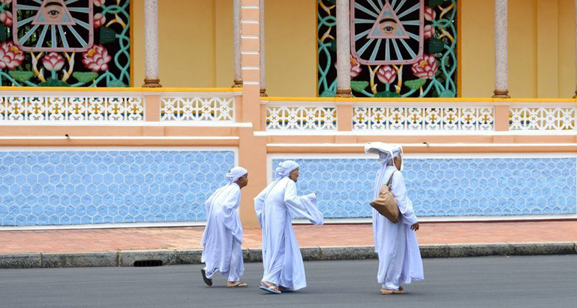 Worshipers in Cao Dai Temple
