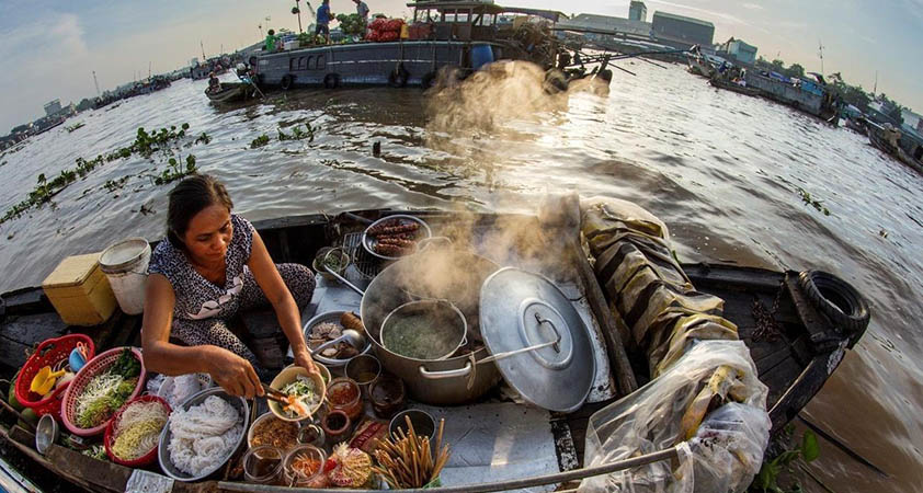 Boats around Cai Be floating market