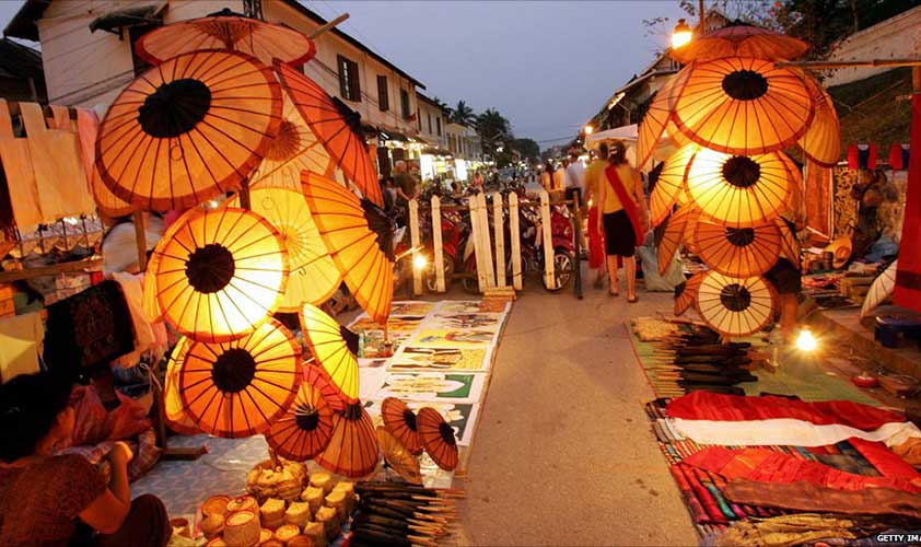 Wander around the Central Market in Luang Prabang