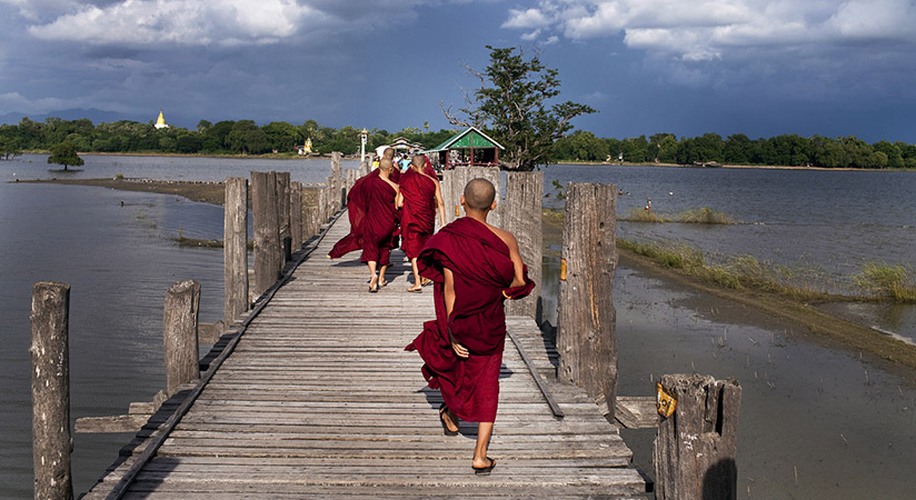 You conclude the day with a view of the beautiful sunset at the over 200-year-old U Bein bridge