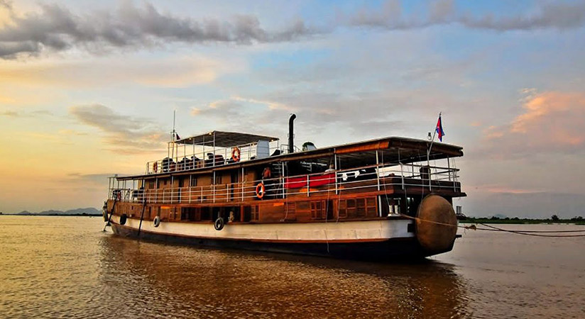 Get on the boat to reach Mekong Riverside Lodge