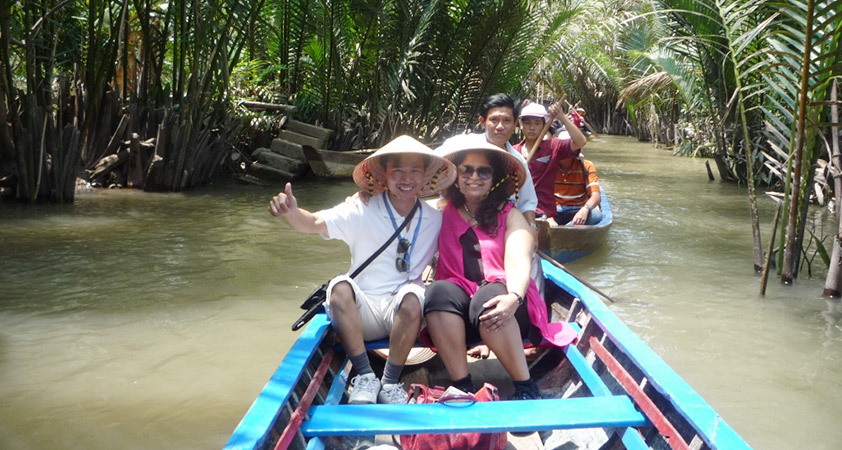 Take a boat for a cruise on the Mekong River